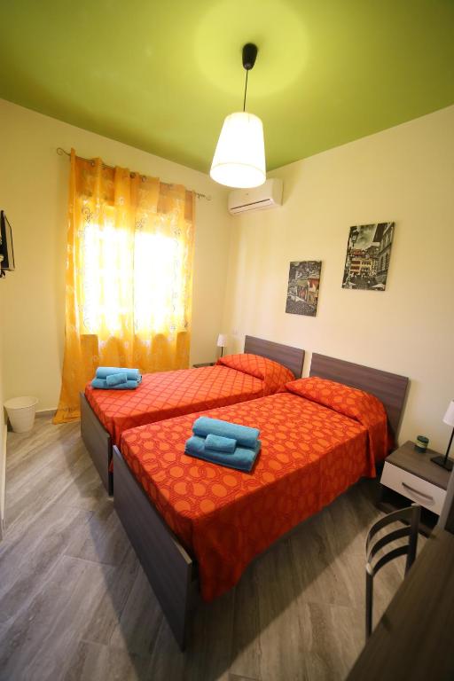 Posteľ alebo postele v izbe v ubytovaní Parco Carrara