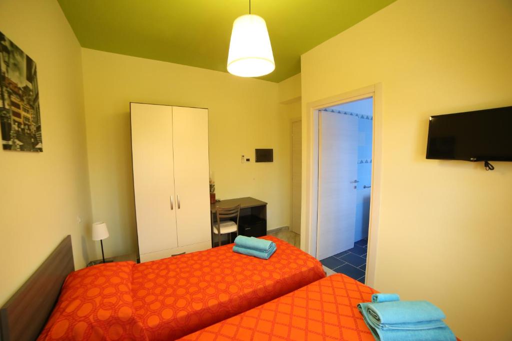 Posteľ alebo postele v izbe v ubytovaní Parco Carrara