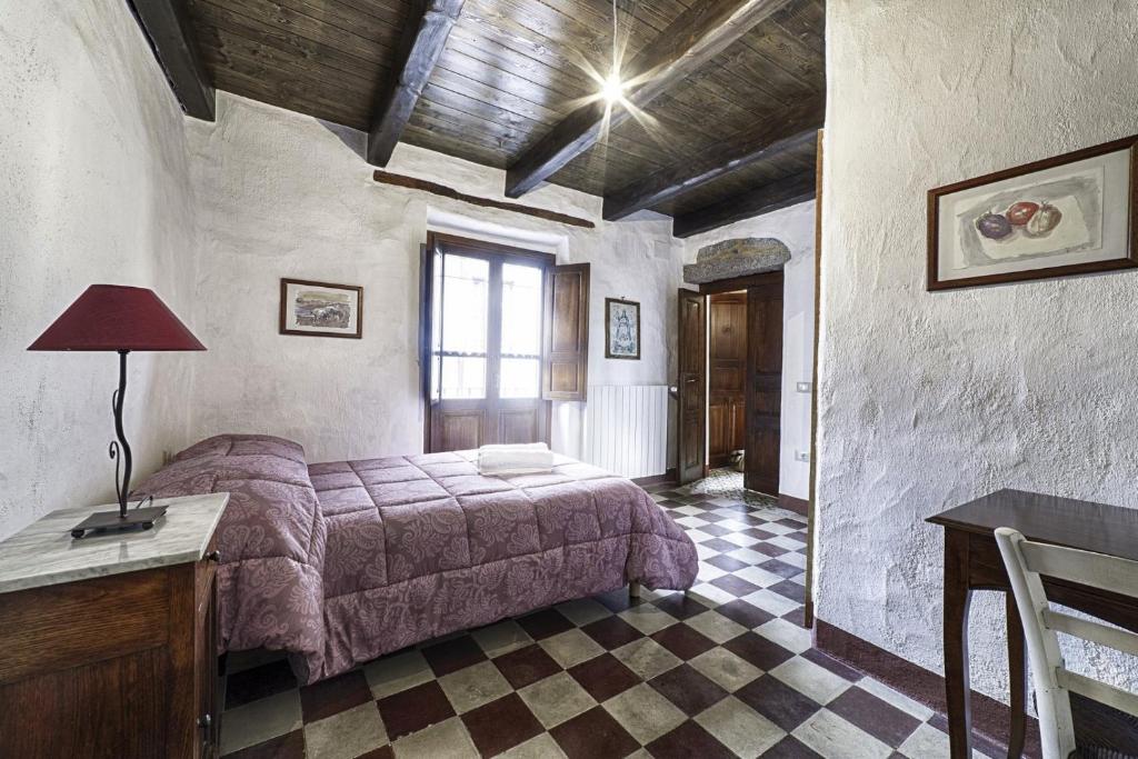 A bed or beds in a room at Casa Masini