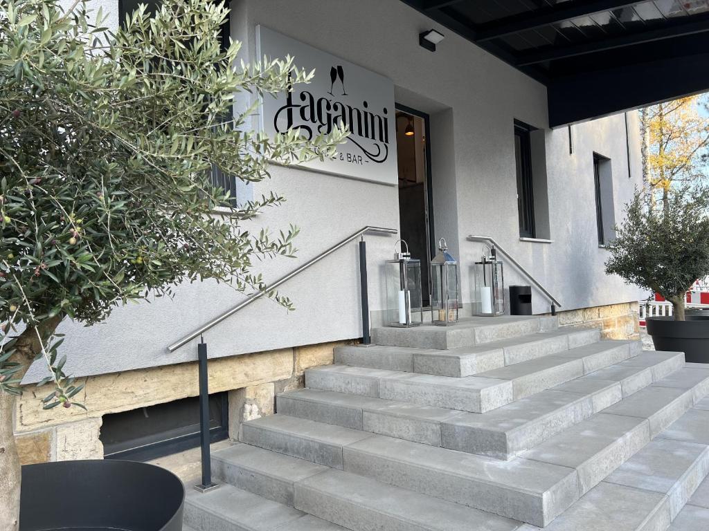 a set of stairs in front of a building at Hotel Falken in Hechingen