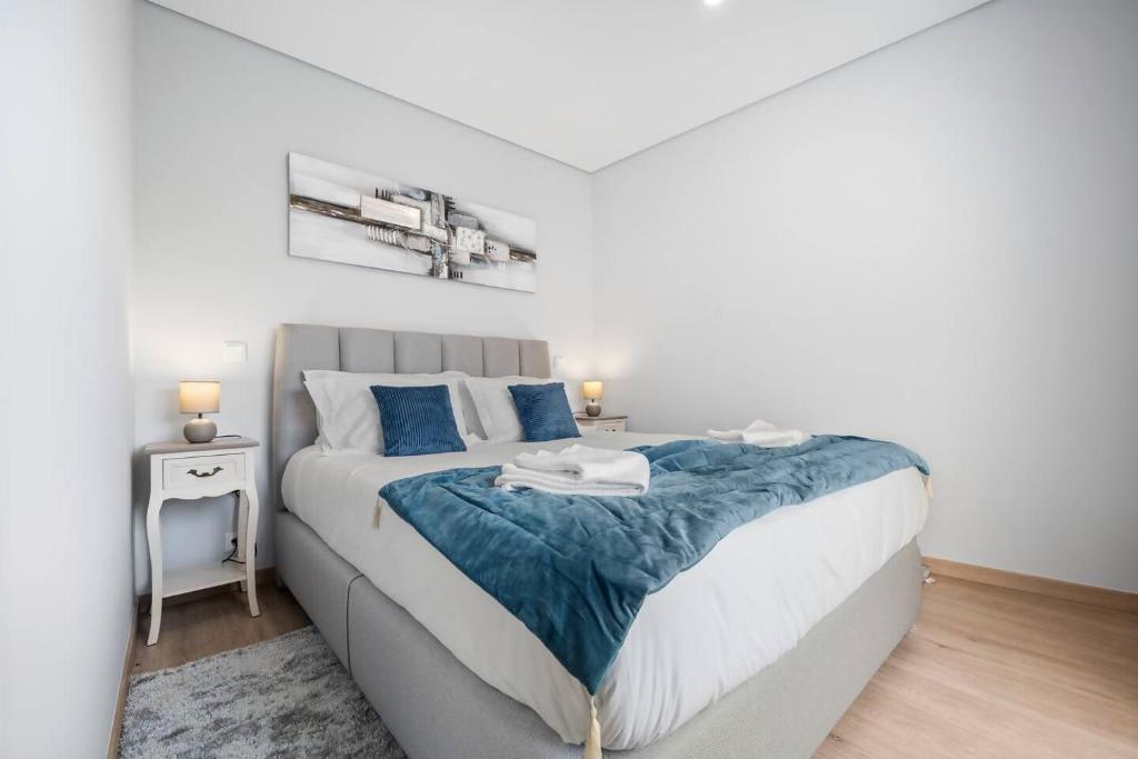 Postel nebo postele na pokoji v ubytování Atlantic View Studio