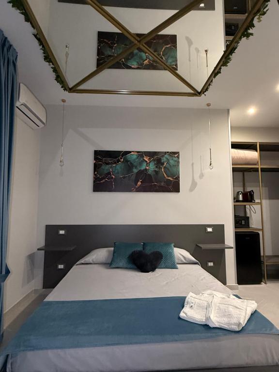 Postel nebo postele na pokoji v ubytování Ladi House