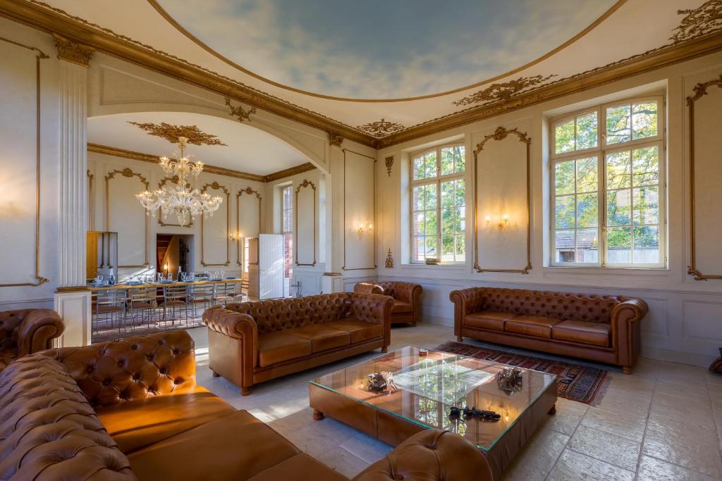 Posezení v ubytování L'Ecole des Naudins - Ancienne école de village