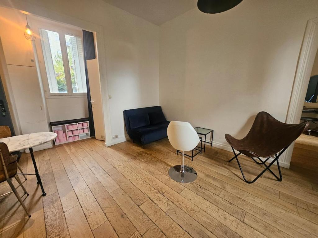 Posezení v ubytování appartement aux portes de Paris