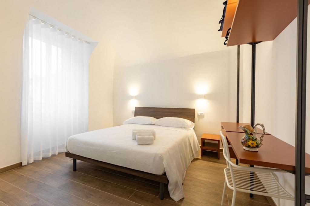 Postel nebo postele na pokoji v ubytování BB Maltagliati