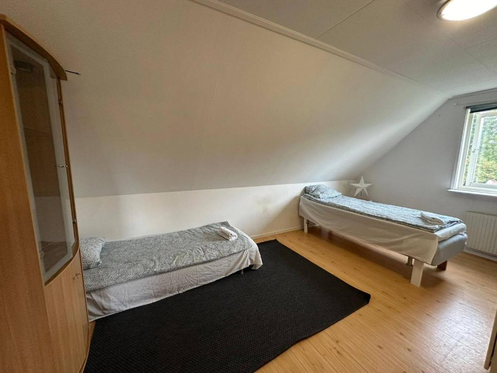 Кровать или кровати в номере Family & Worker Accommodations in Göteborg
