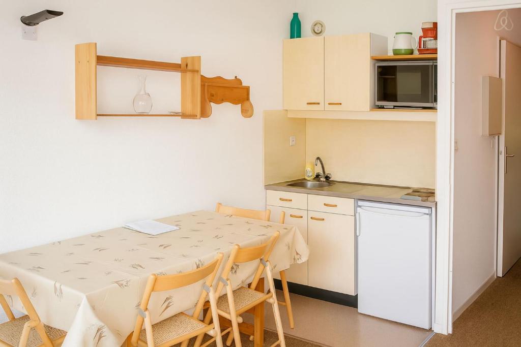 Kuchyň nebo kuchyňský kout v ubytování Duplex lumineux et spacieux en plein centre bourg