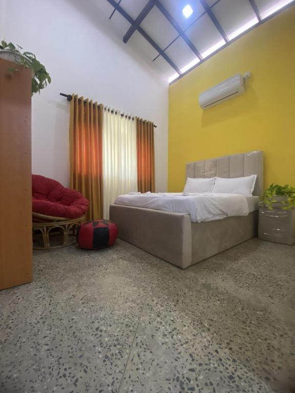 Ένα ή περισσότερα κρεβάτια σε δωμάτιο στο Villa Manthara