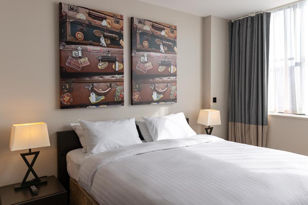 Ένα ή περισσότερα κρεβάτια σε δωμάτιο στο Hotel Xanadu