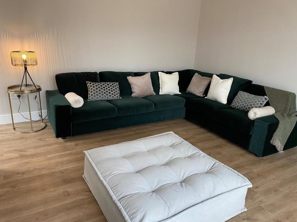 Posezení v ubytování The Stables - Newly Renovated 4 bed house