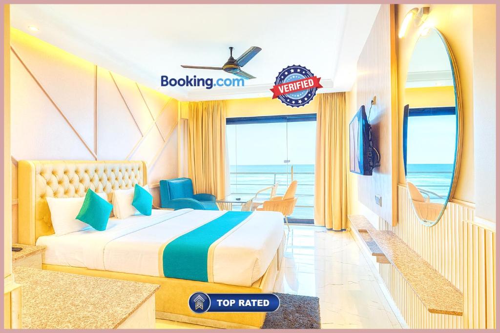 Una cama o camas en una habitación de New Marine Drive Road SkyRise Dreamland Beachfront Sea View Hotel # Air Conditioning Luxury Room # Lift # Restaurant - Parking Facilities - Best Luxuary Hotel In Puri