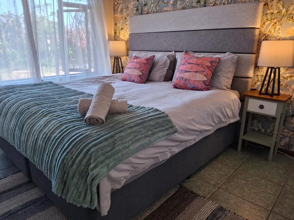 Postel nebo postele na pokoji v ubytování Serendipity Beach House