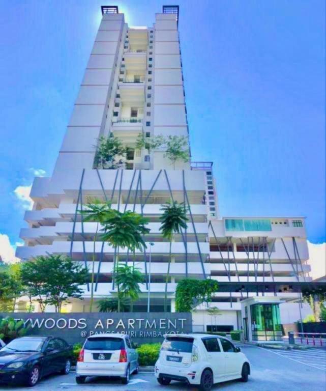 a large building with cars parked in front of it at Citywood by RR JBcity in Johor Bahru