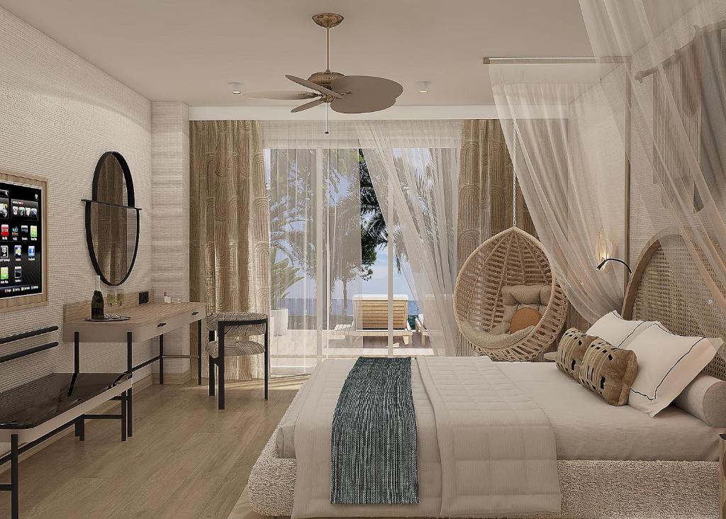 Ένα ή περισσότερα κρεβάτια σε δωμάτιο στο Royal Atlantis Icon