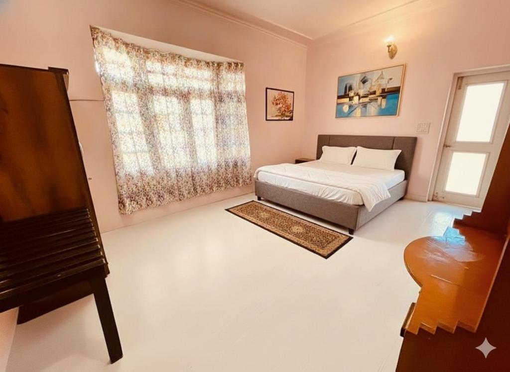 En eller flere senge i et værelse på Nature Reach Cottage