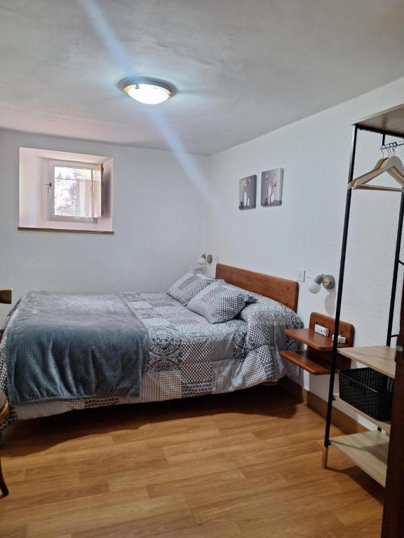 Postel nebo postele na pokoji v ubytování Turismo en Babia Bajo los nidos