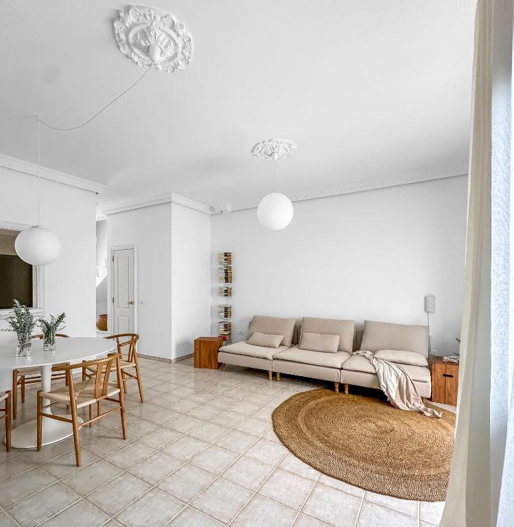 a living room with a couch and a table at 3 BDR Detached house in Chayofa in Chayofa