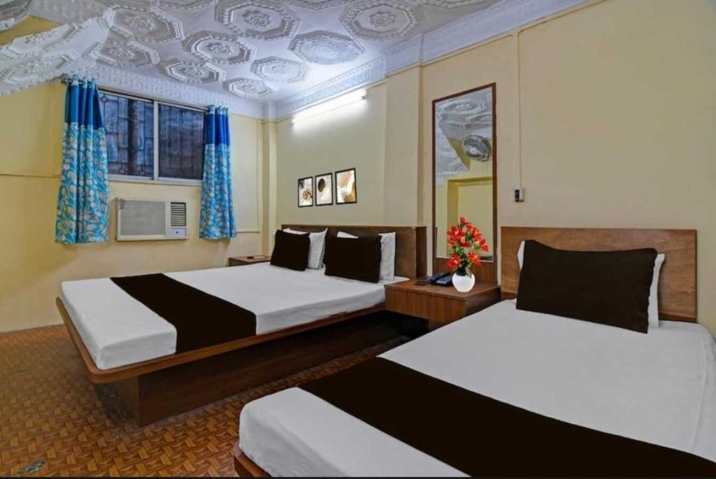 Voodi või voodid majutusasutuse Dear Hotel toas