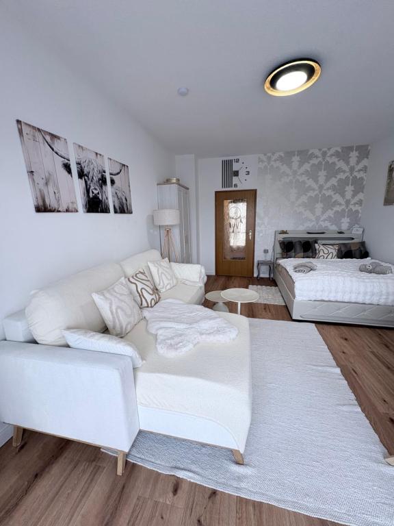 Posezení v ubytování Chiemsee-Perle, stylisches Luxus-Appartement