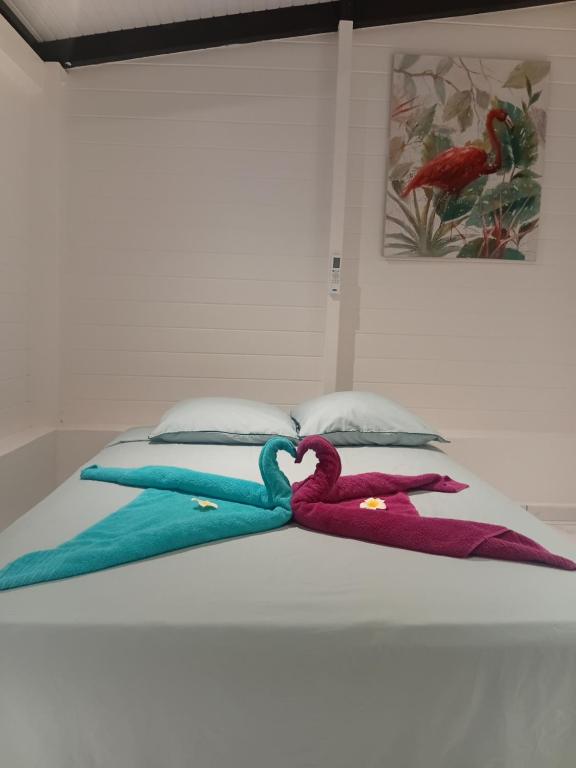 Ένα ή περισσότερα κρεβάτια σε δωμάτιο στο Logement cosy et chic