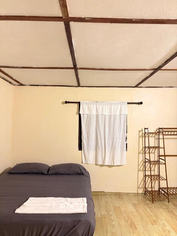 Postel nebo postele na pokoji v ubytování Silver Cliff Bungalow