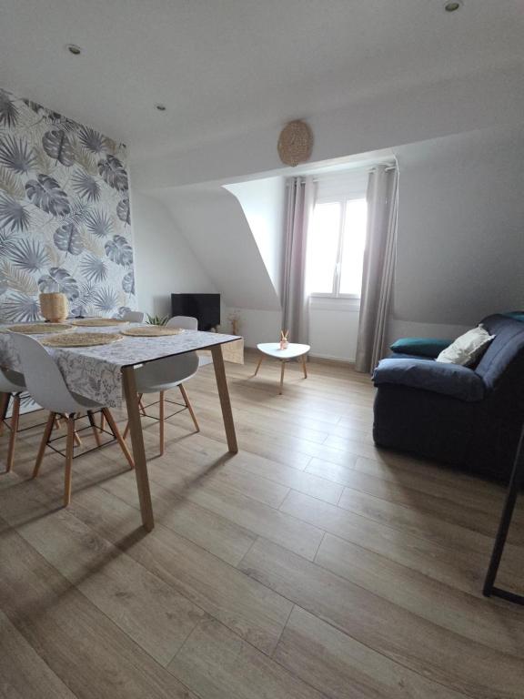 Posezení v ubytování L'appartement cosy du Portel