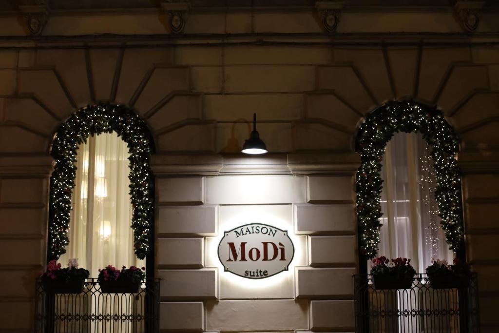 Πιστοποιητικό, βραβείο, πινακίδα ή έγγραφο που προβάλλεται στο Maison MoDì