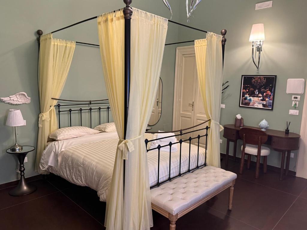 Ένα ή περισσότερα κρεβάτια σε δωμάτιο στο Maison MoDì