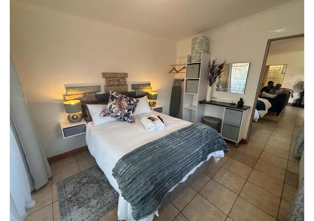 Ένα ή περισσότερα κρεβάτια σε δωμάτιο στο Cottage of Grace