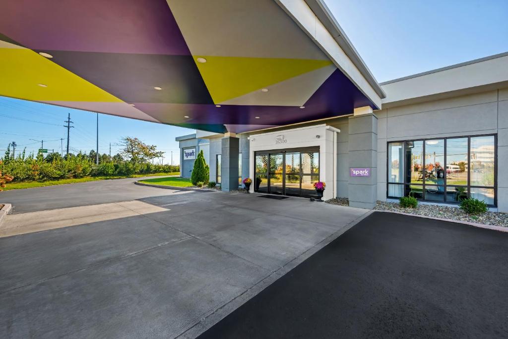 an empty parking lot in front of a building at Spark By Hilton Cleveland Beachwood in Beachwood