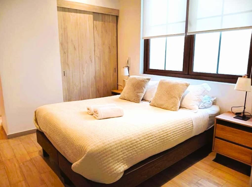 En eller flere senge i et værelse på HOM I Espectacular Estudio a Estrenar en Valparaíso 2PAX 2111