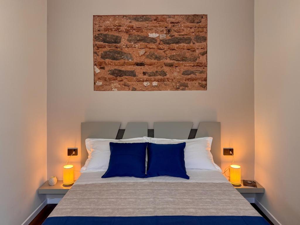 Ένα ή περισσότερα κρεβάτια σε δωμάτιο στο Casa Sarina Catania