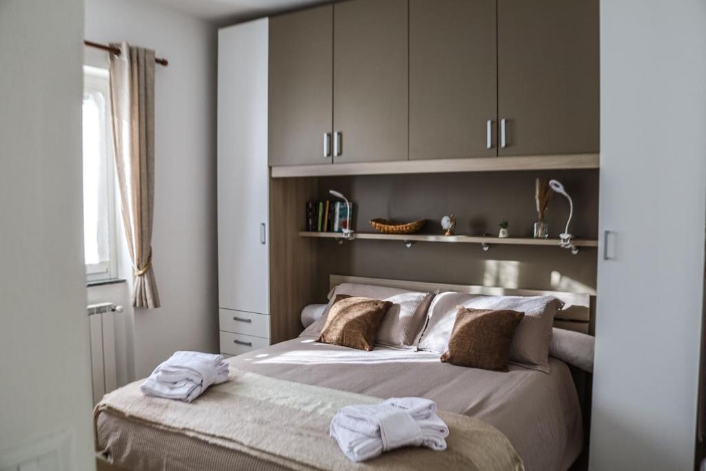 Postel nebo postele na pokoji v ubytování Casa vacanze moderna a 500m dalle piste