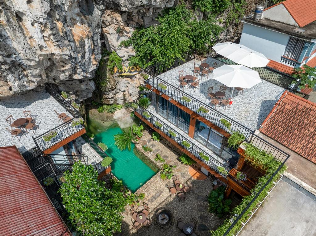 an aerial view of a house with a swimming pool at Favos Ninh Binh Hotel & Villas in Ninh Binh