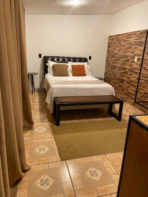 Ένα ή περισσότερα κρεβάτια σε δωμάτιο στο Loft da Lu