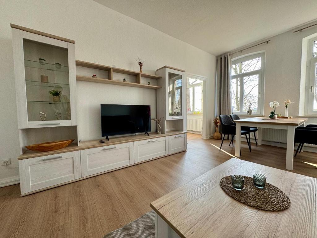 TV a/nebo společenská místnost v ubytování Seelöwe beim Ochsenturm am Deich