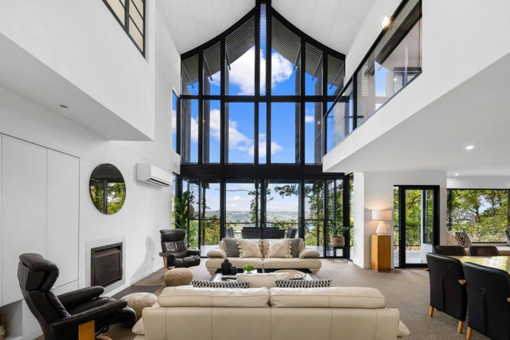 a living room with a large glass wall at Magical Malindi, Montville. QLD in Montville