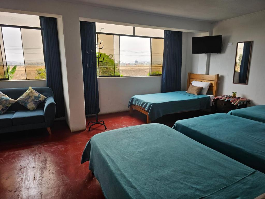 Postel nebo postele na pokoji v ubytování Jorge Chavez Lima Airport Hostel - FREE AIRPORT PICK UP