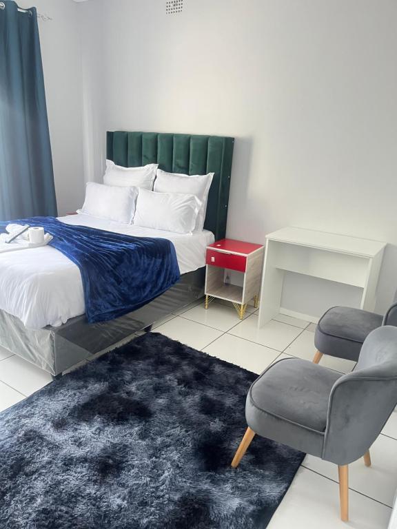 Giường trong phòng chung tại The Perfect Place