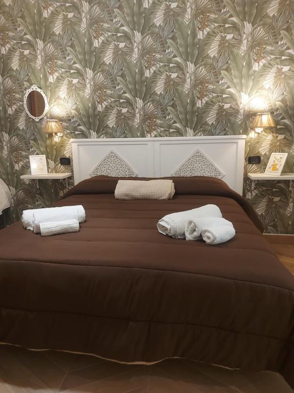 Giường trong phòng chung tại B&B La Rotonda