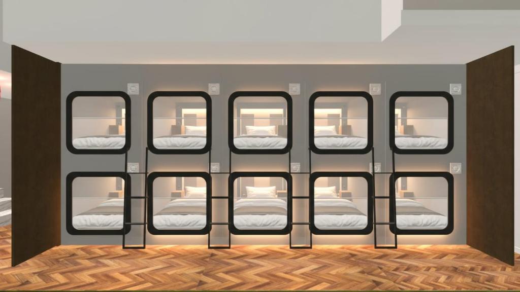 Posezení v ubytování Cápsula Hotel