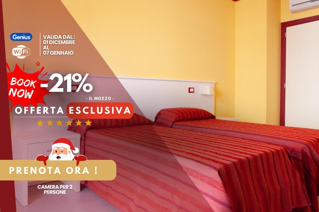 Postel nebo postele na pokoji v ubytování Stanza per 2 ospiti nel centro, a due passi dal mare - Il Mozzo!