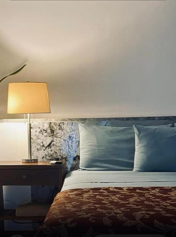 Ένα ή περισσότερα κρεβάτια σε δωμάτιο στο bamboo bed and breakfast