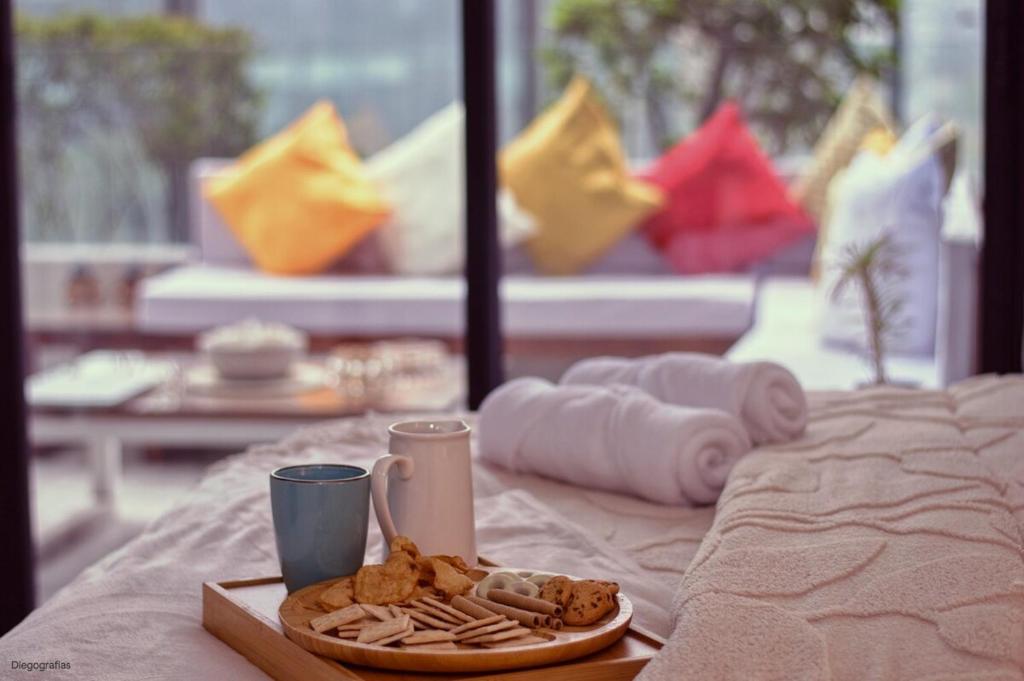 Кровать или кровати в номере Terraza Amplia Ubicación Premium Estacionamiento Privado