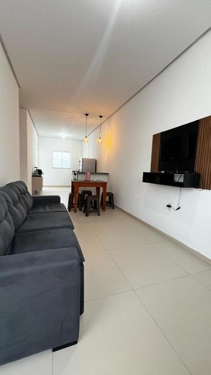 Posezení v ubytování Casa aconchegante e familiar