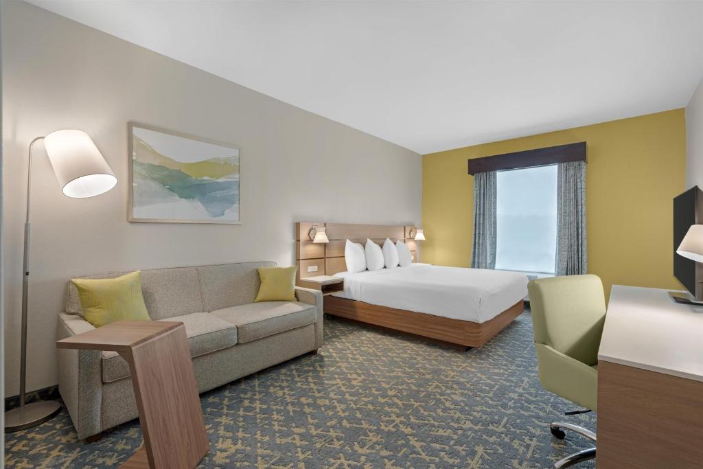 Ένα ή περισσότερα κρεβάτια σε δωμάτιο στο Best Western Wesley Chapel