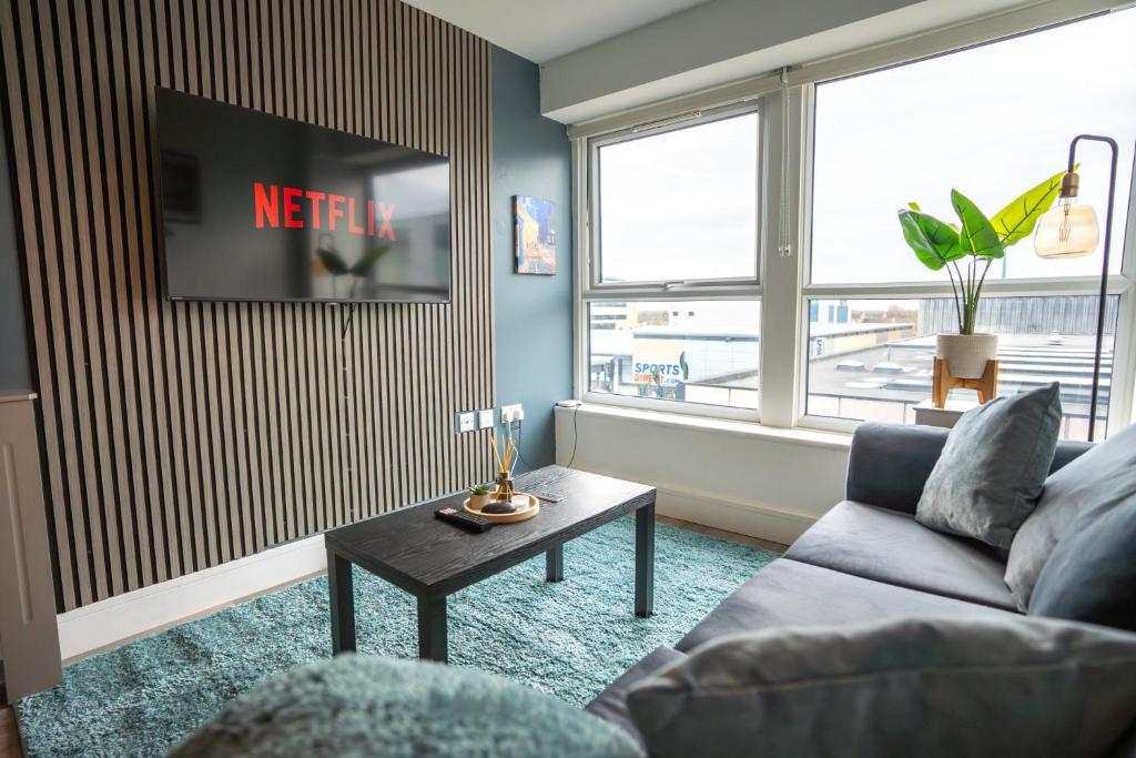 A television and/or entertainment centre at Harlow Flat - Perfect for Families or Contractors