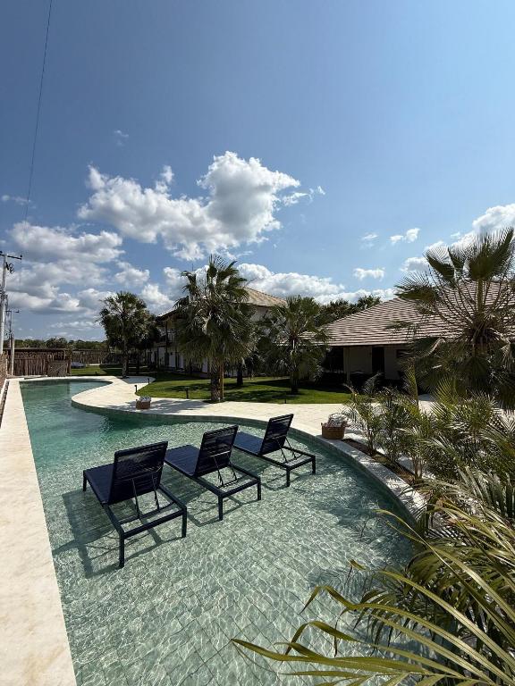 Πισίνα στο ή κοντά στο Casa a 2 minutos a pé da praia