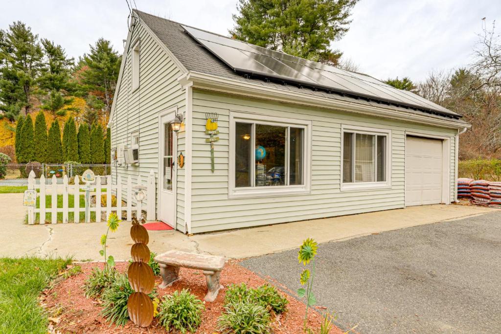 a small white house with a window at Near Quabbin Reservoir Peaceful Palmer Studio in Palmer