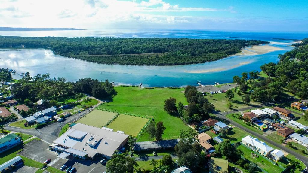 an aerial view of a town and a river at Waterview Motel Sussex Inlet in Sussex inlet